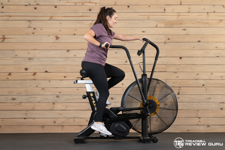 Bells of Steel Blitz Woman Pedaling