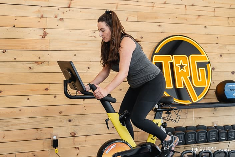 Freebeat Boom Bike Woman Standing Pedaling