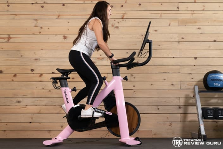 Freebeat Lit Bike Woman Pedaling