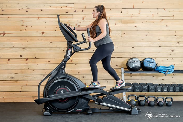 Sole E25 Elliptical Woman Pedaling