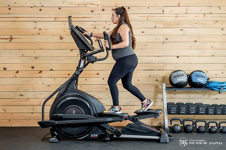 Sole E35 Woman Using elliptical