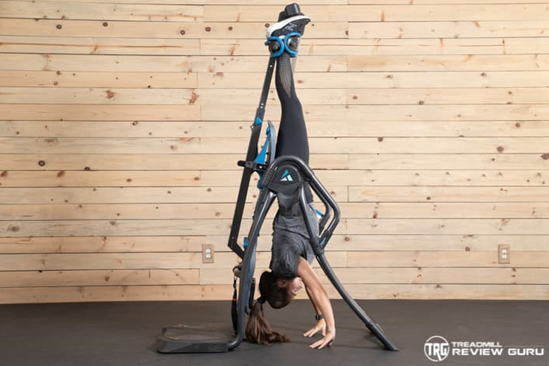Teeter FitSpine LX9 Woman Upside Down